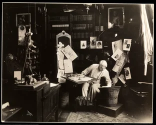 David Belasco seated in his study in New York, 1909